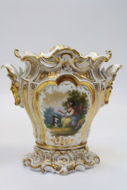 Pair of Paris porcelain vases, each resting...