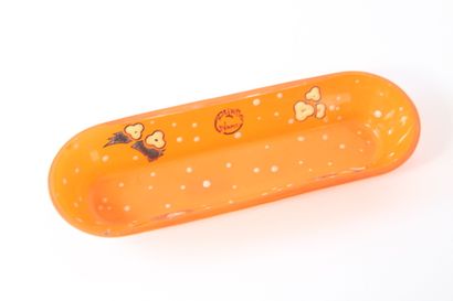 DELATTE Nancy.
Toilet set in orange-tinted...