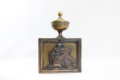 Pair of bronze andirons decorated with antique-style...