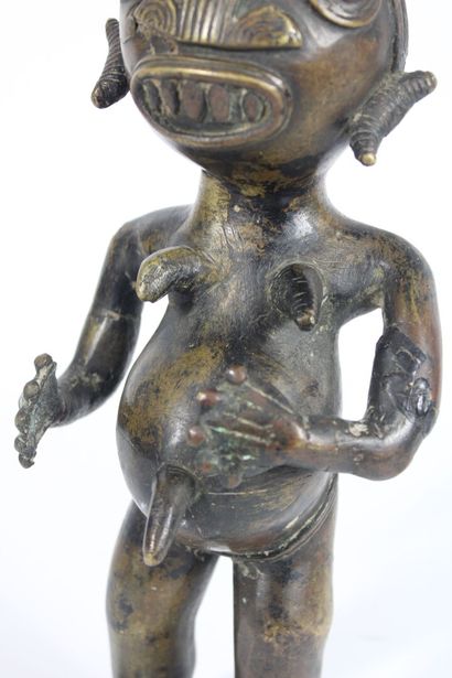 AFRICA. 
Divinity in patinated bronze. Mid...