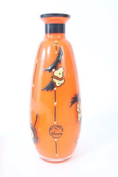 DELATTE Nancy.
Toilet set in orange-tinted...