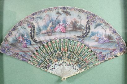 Bone fan with painted scenes of gallantry....