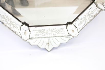 Octagonal Venetian mirror with engraved pediment...