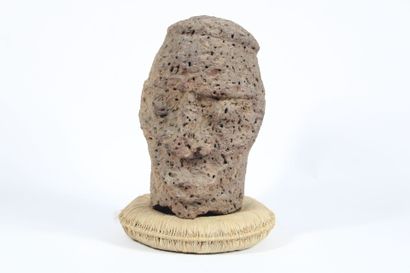 AFRICA. 
Head in volcanic stone. Mid-twentieth...