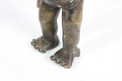 AFRICA. 
Divinity in patinated bronze. Mid...