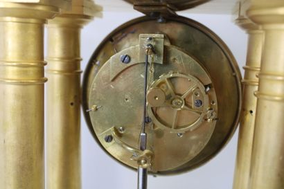 Gilt bronze portico clock with flower and...