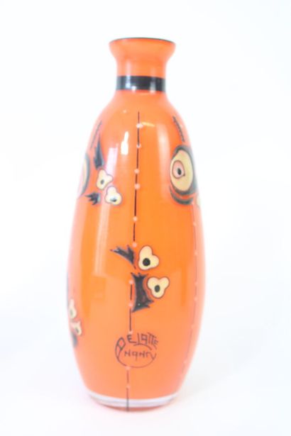 DELATTE Nancy.
Toilet set in orange-tinted...