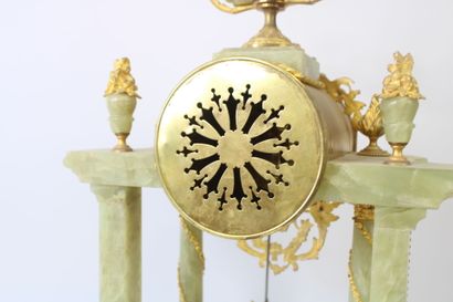 Hardstone and bronze portico clock decorated...