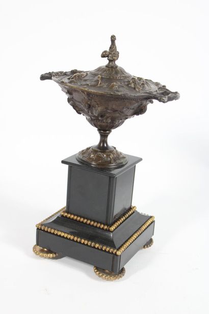 Pair of bronze cassolettes with plant decoration...