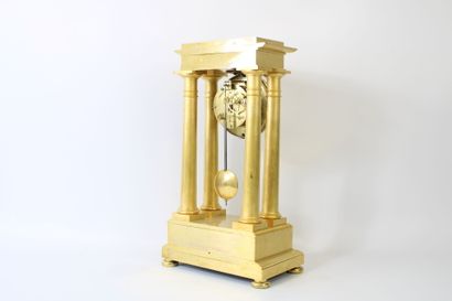 Gilt bronze portico clock with flower and...