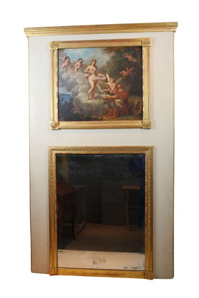 Molded and carved wood trumeau with a mirror...