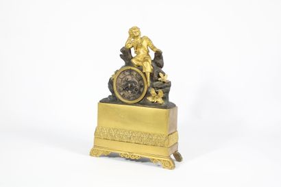 Gilt bronze and patinated clock decorated...