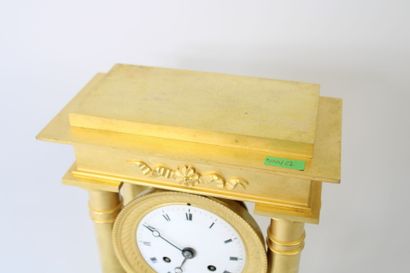 Gilt bronze portico clock with flower and...