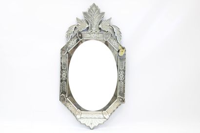 Octagonal Venetian mirror with engraved pediment...