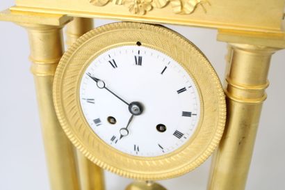 Gilt bronze portico clock with flower and...