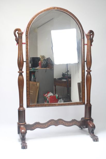 Large mahogany psyche mirror. Curved pediment,...