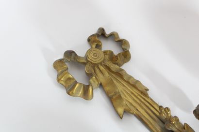 Pair of large wall sconces in chased and...