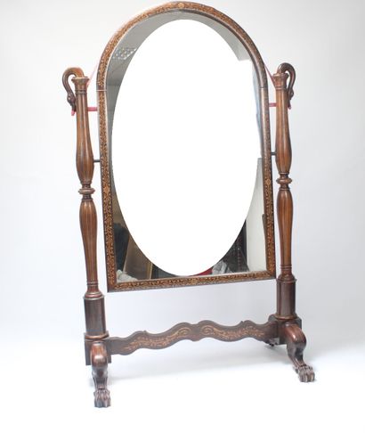 Large mahogany psyche mirror. Curved pediment,...