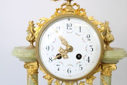 Hardstone and bronze portico clock decorated...