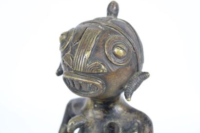 AFRICA. 
Divinity in patinated bronze. Mid...