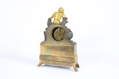 Gilt bronze and patinated clock decorated...