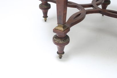 Gueridon in burr wood, ormolu trim decorated...