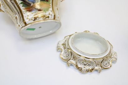 Pair of Paris porcelain vases, each resting...