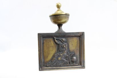 Pair of bronze andirons decorated with antique-style...