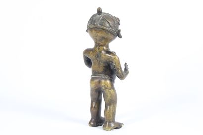 AFRICA. 
Divinity in patinated bronze. Mid...