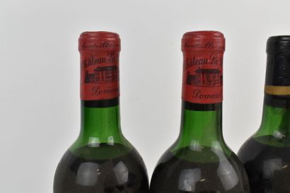 4 bouteilles de POMEROL 1961 du Château LA...