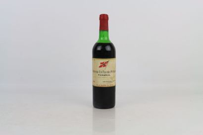 1 bouteille de POMEROL 1975 du Château LA...