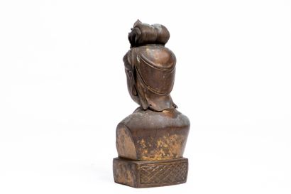 ASIA.
Bronze bust of a divinity. A stamp...
