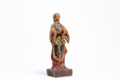 La Vierge MIraculeuse 
Statue en bois sculpté...