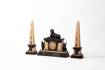 Egyptian style mantel set decorated with...