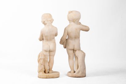 Pair of white marble Putti, representing...