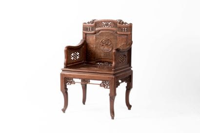 Natural wood armchair with straight, carved...