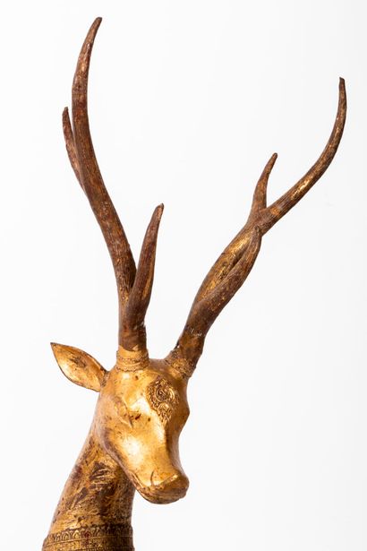 Pair of two deer in carved and gilded metal...