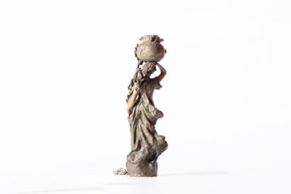 Large patinated terracotta lamp depicting...