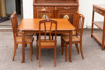 Wooden dining room with ormolu trim, comprising...