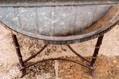Large tripod pedestal table in gilded metal...