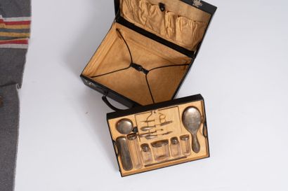 Leather case containing a silver-plated monogrammed...