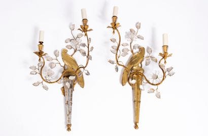 RINGS. Attributed to.
Pair of two-light sconces...