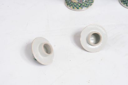 CHINA.
Pair of covered pots in green family...