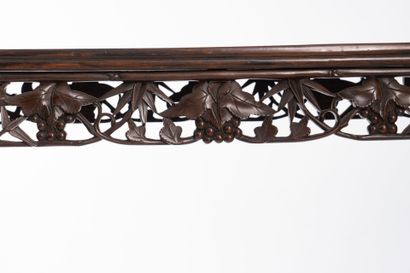 CHINA.
Carved wood console decorated with...