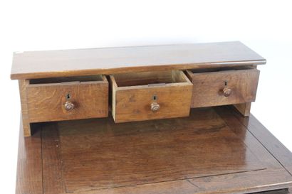 Natural wood desk opening with 3 drawers...