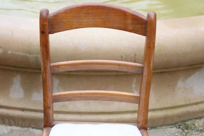 Set of eight wooden chairs, with beige fabric...