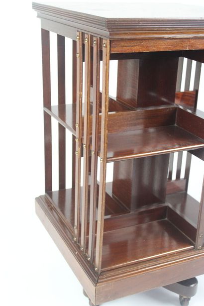 Revolving bookcase in natural wood. 
English...