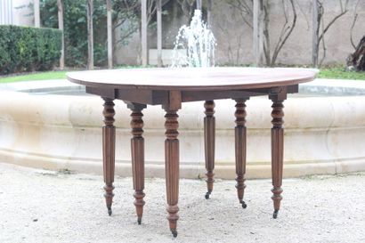 Round wooden table with shutters, resting...