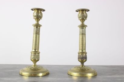 Pair of chased and gilt bronze candlesticks...