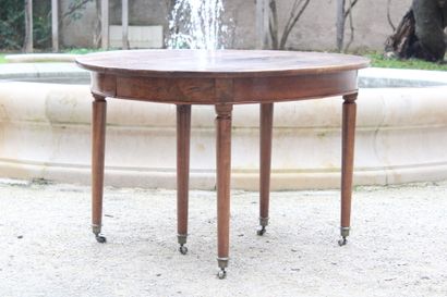 Round walnut table with extension system,...